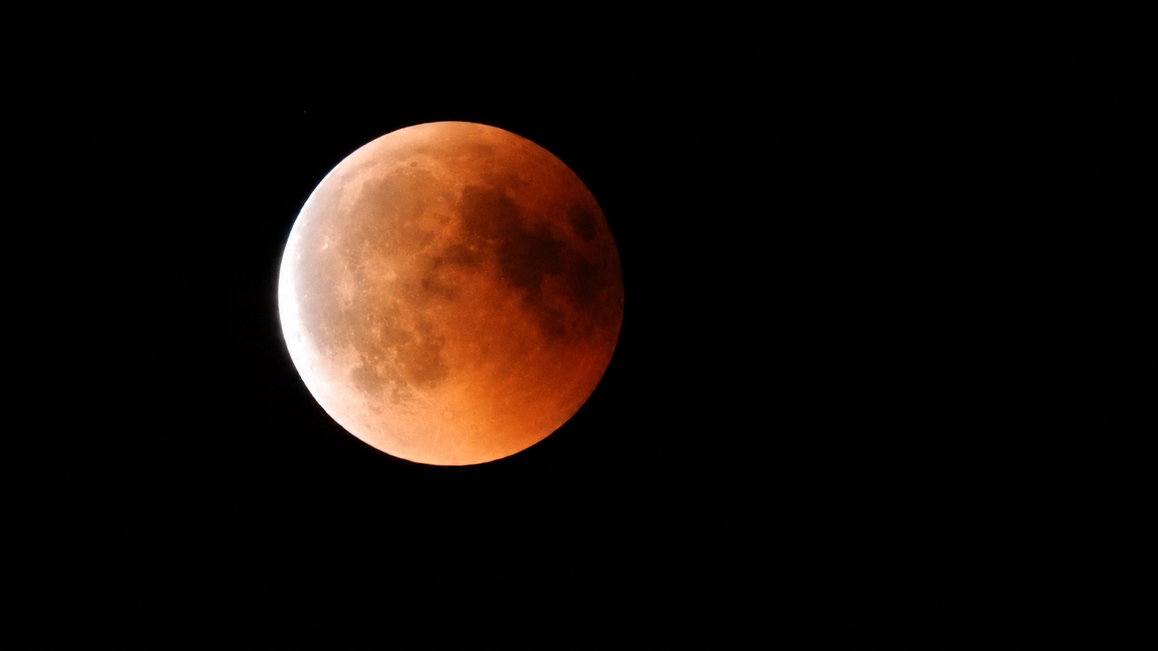 Image: The total lunar eclipse of 27 July 2018 as the Moon emerged from the umbra