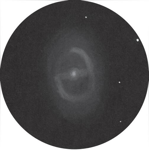 M95, as it appears in a 400-mm telescope
under a country sky. Uwe Glahn