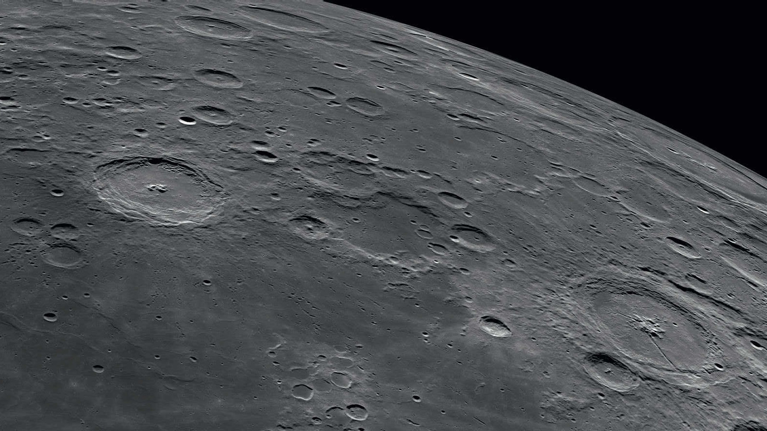 Langrenus and Petavius are two typical lunar impact craters with central mountains. NASA/GSFC/Arizona State University