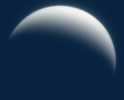 Photograph of the waning crescent Venus in the daytime sky. Mario Weigand